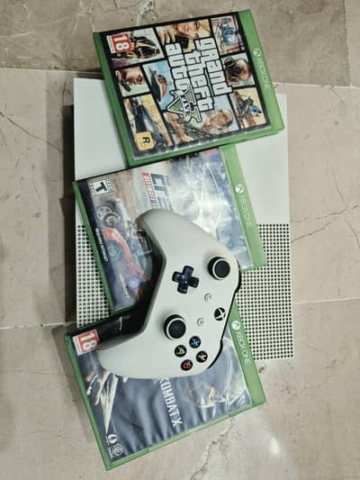 Xbox one s for sale comes with controller and games