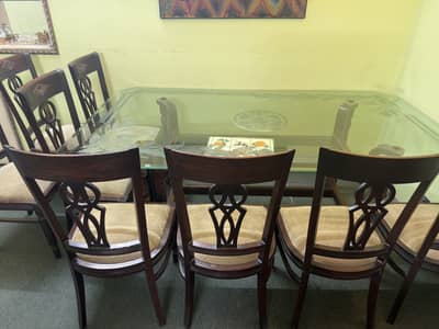 8 seater dining table in glass