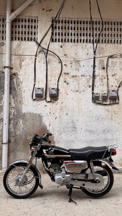 Honda 125 self start silver edition
