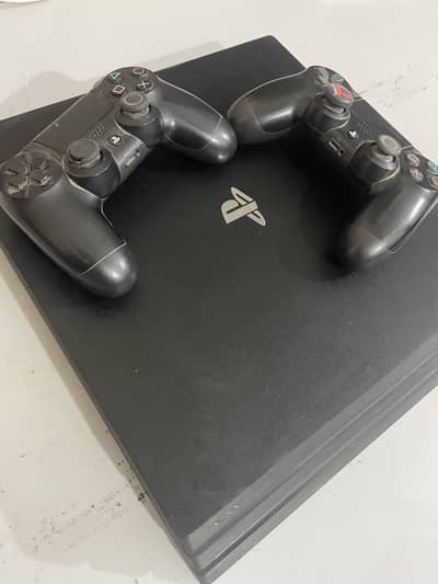 Ps4 pro 1 tb sealed with 2 controllers 13.04 version