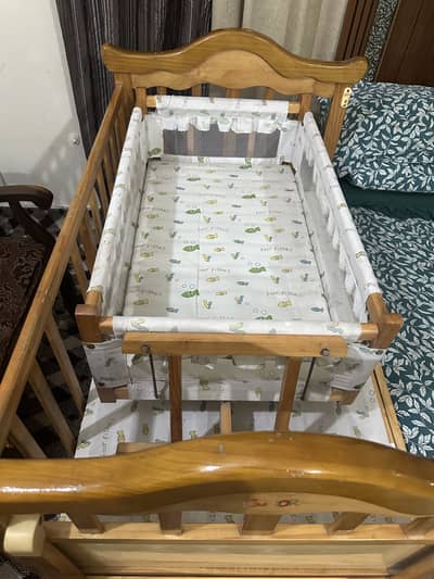 Solid baby wooden coat with removeable baby cradle- Good condition