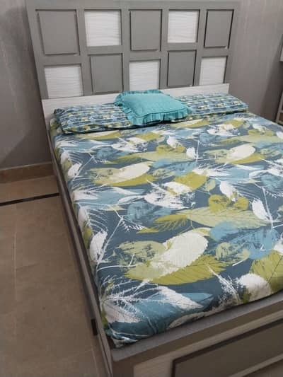 Bed with drawer