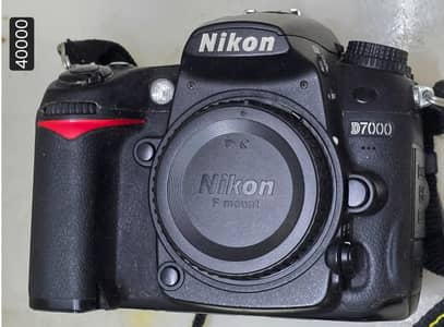 nikon D7000 body. lenses and bags.