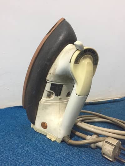 Electric pressing iron for sale.