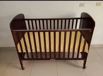 this Baby cots change to baby bed. it has 4  sides bhumper Guard.