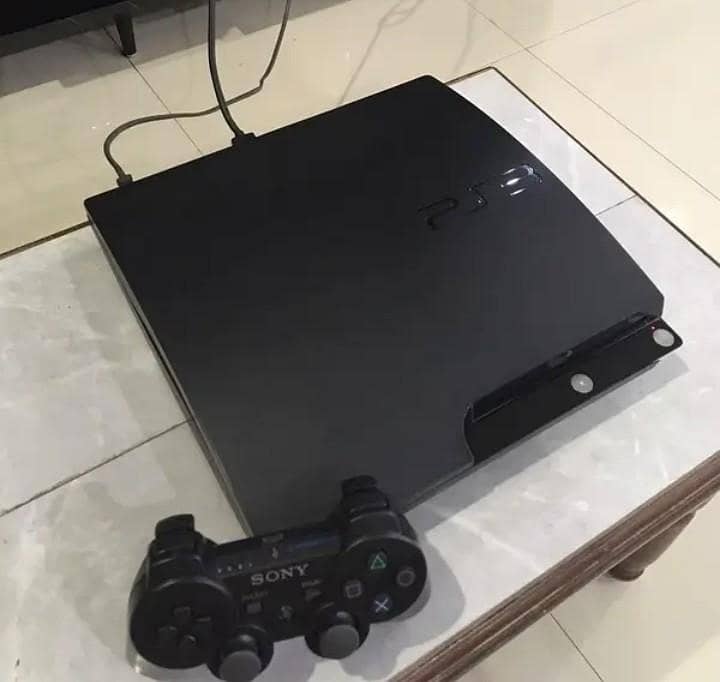 PS3 Slim (Used) + 2 Controllers 1