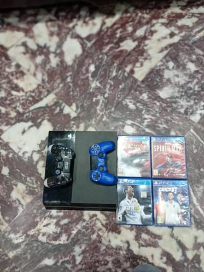 PS4 FAT 500GB WITH 4 GAMES
