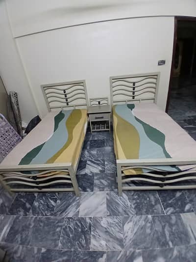 2 Single Beds With Coffee/Side Table