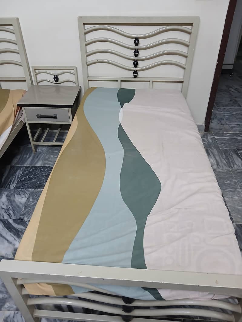 2 Single Beds With Coffee/Side Table 1