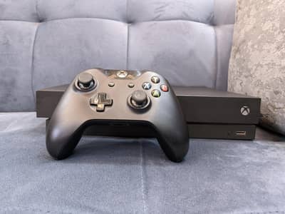 Xbox one X 1TB with Original Controller and 4k Games Jailbreak