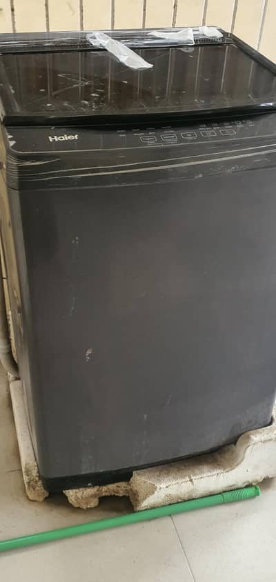 Haier washing machine fully automatic next to brand new 75000