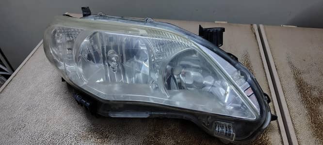 HEAD LIGHT COROLLA 2013 GLI