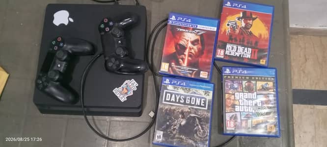 ps 4 slim with 5 CDs