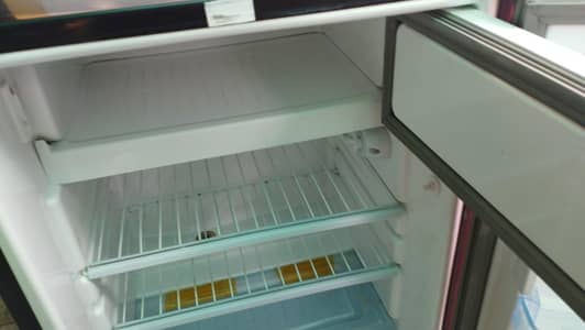 dawlance room single door refrigerator.