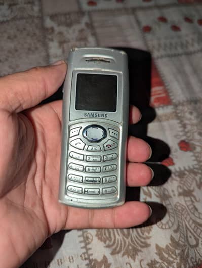 Samsung C100, read description