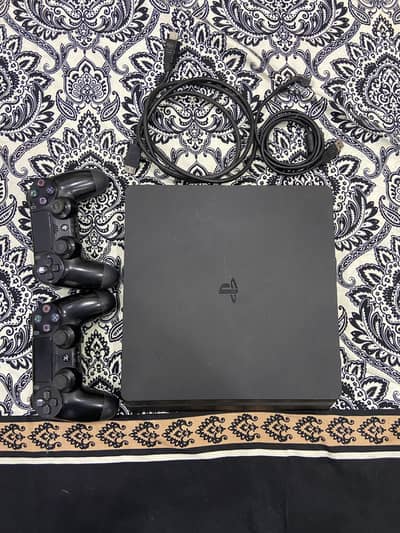 PS4 Slim 256 gb SSD, with 2 controllers