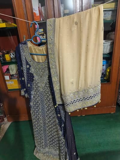 beautiful valima dress blu and fon clour .