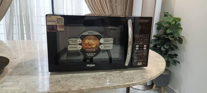 Haier Rotisserie & Convection Microwave Oven – Excellent Condition