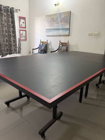 Black top table tennis table available for sale. Foldable table.