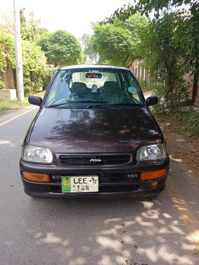 Daihatsu Cuore 2012 Automatic better than mehran cultus alto santro ek