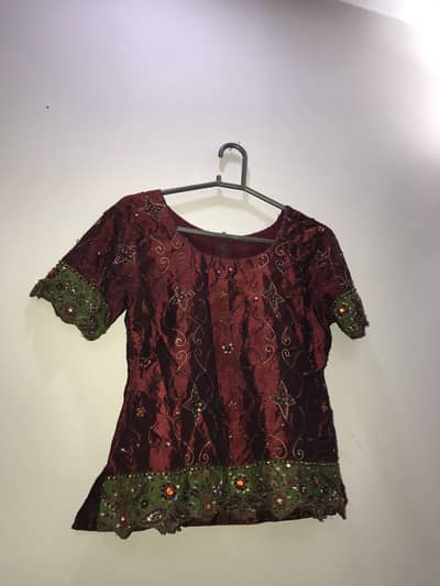 Maroon and green lehnga and blouse
