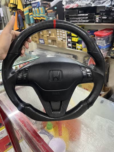 Original carbon fiber multi media and cruise control steering