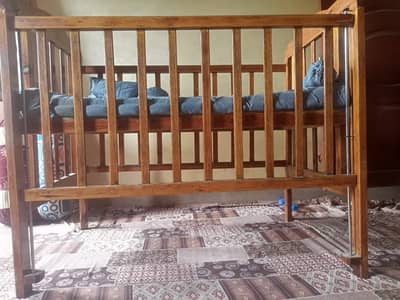 Wooden baby cot