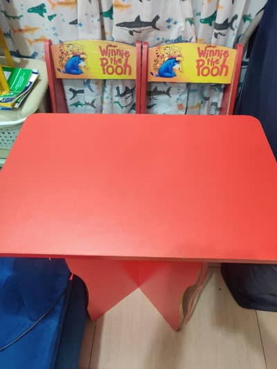 red study table and 2 chairs