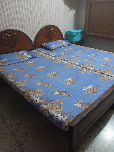 2 Single wooden beds