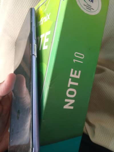 Infinix  note 10.6/128 with box and charger . panal change