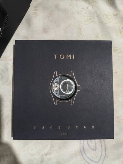 Tomi brand watch