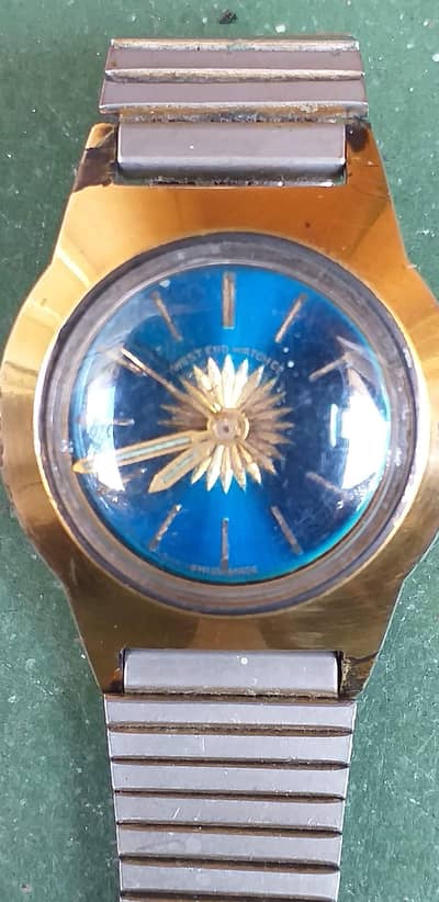 old gold plated west end watch