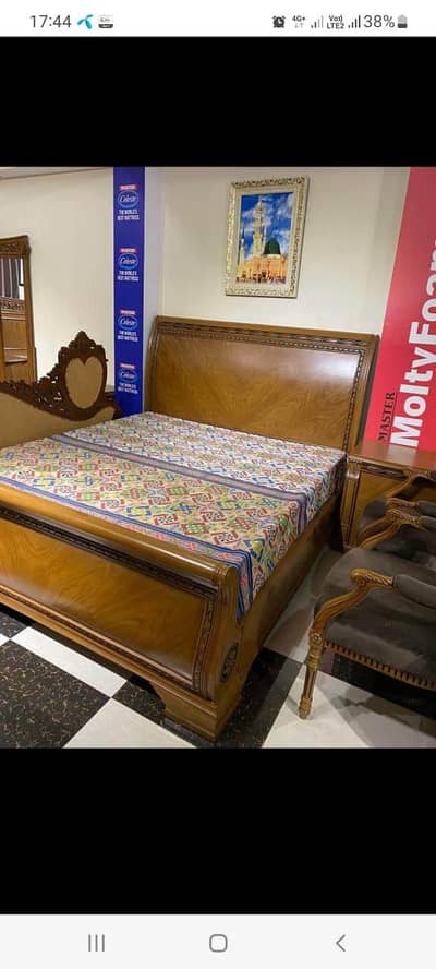 bed with 2 side tables and dressing