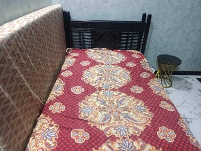 iron 2 single bed for sale with one mettars free