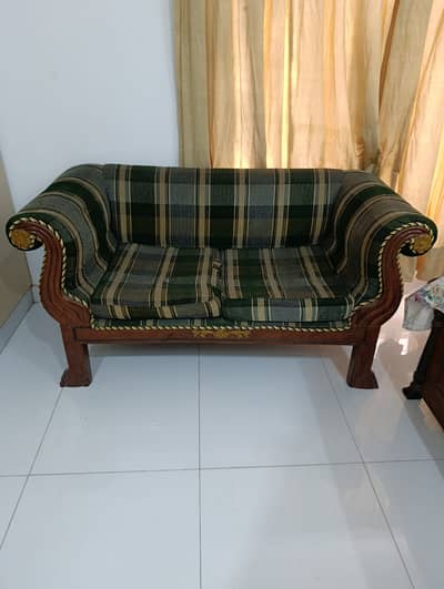 Two Seater Sofa as shown in the picture.