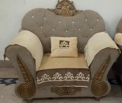elegant 7 seater sofa set with it's cover and cushions