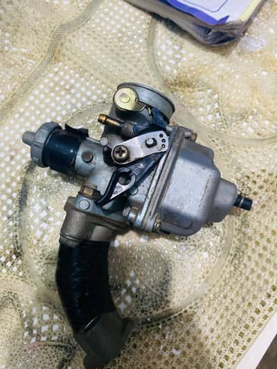 125 ka carburetor hai pz26 sirf 2month chala hai