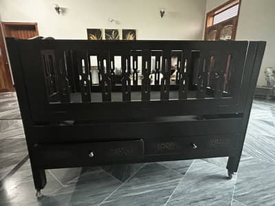 Wooden baby cot