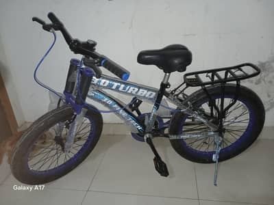 blue and black Turbo 3.0 Fine Tech bicycle