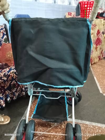 Black foldable Pram