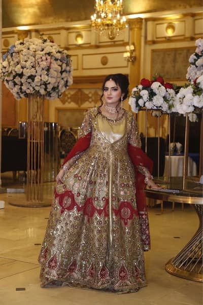 exquisite Designer Maroon and Gold heavily embellished bridal Maxi