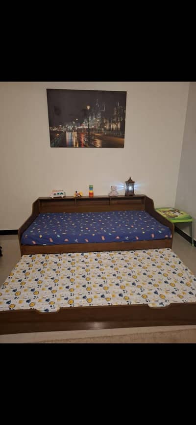 Brand new double sliding bed with mattress.