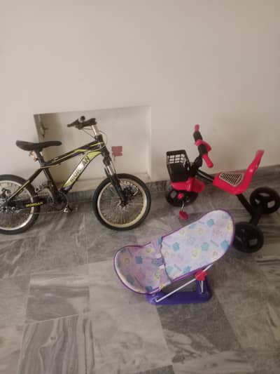 5 to 6 years bicycle and a tricycle with bath swing