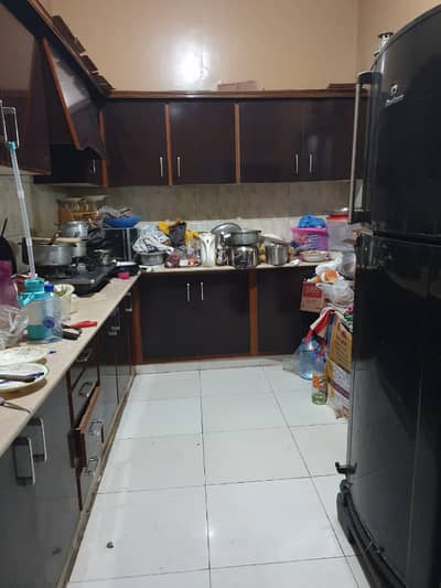 three bed dd ground tiled flooring portion for rent in johar