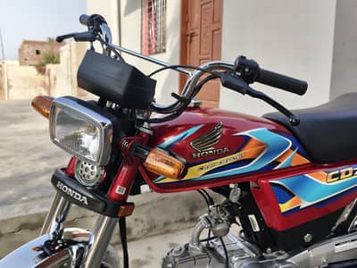 Honda CD 70 Red Color - Just 1,680 KM Driven - Super Clean