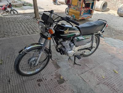 Honda 125 self start silver special edition