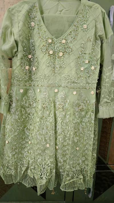 3pice net frock  light green color .