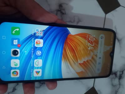 Infinix Smart 5 all ok 10 by 10 battery time good ha 64 ha Mera