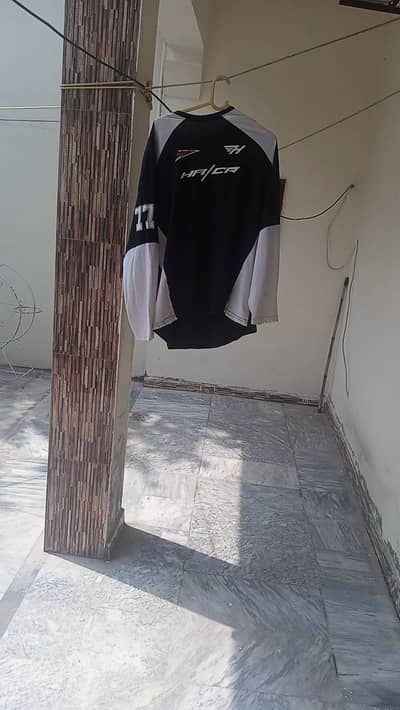 black and white full sleeves racing jersey worn 1-2 times