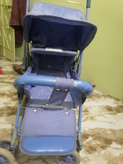 blue baby stroller with basket good condition